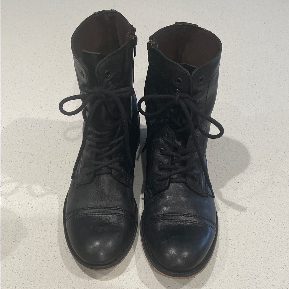 Steve Madden - TREK BOOTS.  Black leather, wooden sole, great used condition.